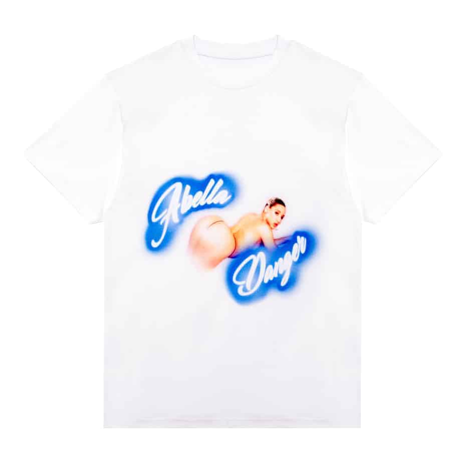 Brazzers Abella Danger White Airbrush T-shirt with her name written on it along with a sexy image of her lying down and showing her round ass while looking at the camera from the right side.
